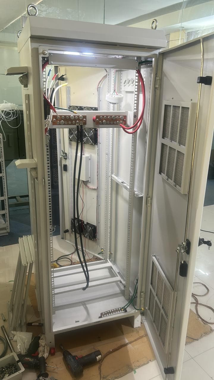 A Stenmore telecom cabinet being wired on the factory floor
